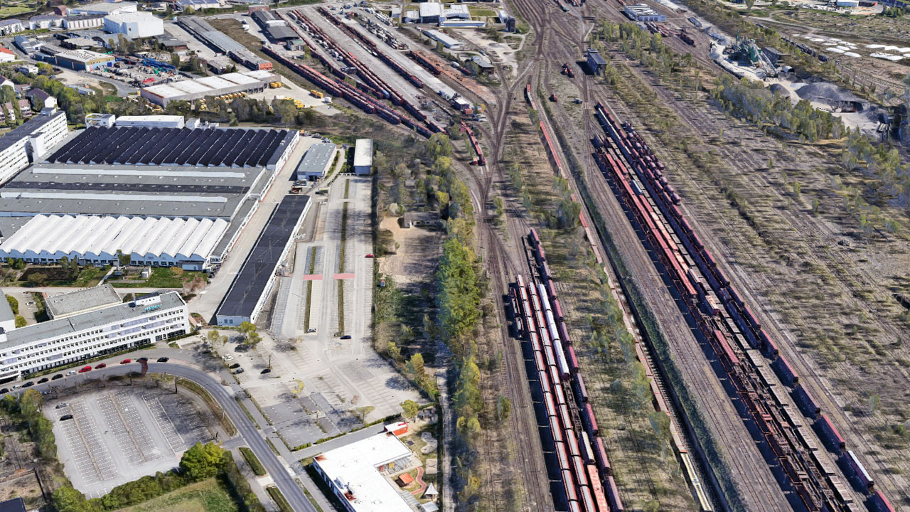 Vergleichsbild aus Google Earth = Luftaufnahme Güterbahnhof in Braunschweig 1945